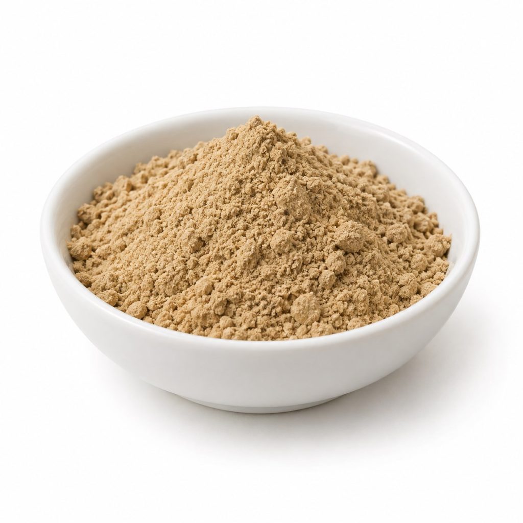 Illustrative aniseed powder in a white ceramic bowl